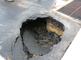 Sinkhole Formation in Driveway